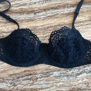 2/$25. Dim bra in size 34A. Black lace/machine washable.
